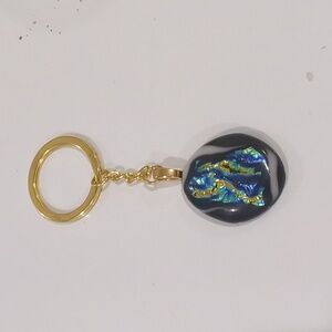 Unique marbled Hand crafted artisan bag charm or key chain with Dichroic glass.